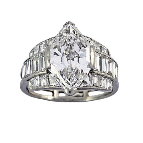 Art Deco hexagonal diamond and baguette diamond half hoop ring by Marchak, Paris, the principal step cut hexagonal diamond set portrait,